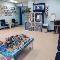 reception area with seating and toys at Mavis road Mississauga